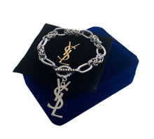 Load image into Gallery viewer, Repurposed Yves Saint Laurent Vertical Charm Toggle Bracelet