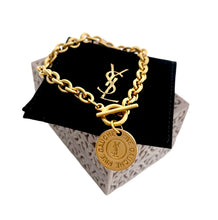 Load image into Gallery viewer, Repurposed Yves Saint Laurent Double Sided Charm Toggle Bracelet