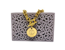 Load image into Gallery viewer, Repurposed Yves Saint Laurent Double Sided Charm Toggle Bracelet