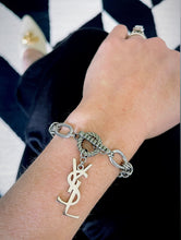 Load image into Gallery viewer, Repurposed Yves Saint Laurent Vertical Charm Toggle Bracelet