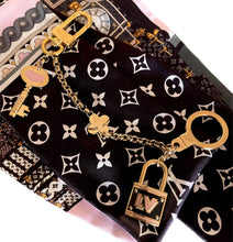 Load image into Gallery viewer, Repurposed Louis Vuitton Keyclasp & Butterfly~Heart Charm Bracelet