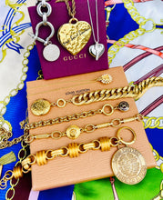 Load image into Gallery viewer, Repurposed YSL Bar & White Enameled Flower Charm Necklace