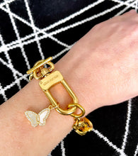 Load image into Gallery viewer, Repurposed Louis Vuitton Keyclasp & Mother of Pearl Butterfly Charm Bracelet