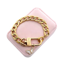 Load image into Gallery viewer, Repurposed Louis Vuitton Keyclasp & Mother of Pearl Butterfly Charm Bracelet