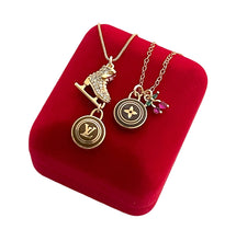 Load image into Gallery viewer, Repurposed Louis Vuitton Gold &amp; Café Coin Cherry Charm Necklace