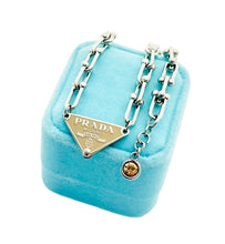 Load image into Gallery viewer, Repurposed Beige &amp; Silver PRADA Tag Hardware Necklace