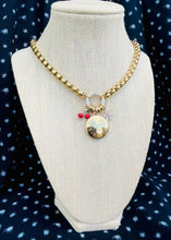 Load image into Gallery viewer, Repurposed Large Louis Vuitton Disc &amp; Cherry/Snowflake Charm Necklace