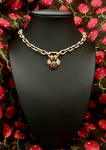 Load image into Gallery viewer, Repurposed Louis Vuitton Gold &amp; Cafè Reversible Coin Charm Necklace