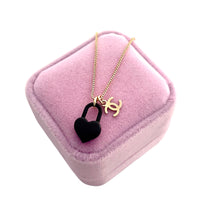 Load image into Gallery viewer, Repurposed Mini Gold Tone CC Charm &amp; Black Heart Lock Necklace