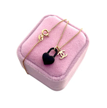 Load image into Gallery viewer, Repurposed Mini Gold Tone CC Charm &amp; Black Heart Lock Necklace