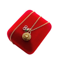 Load image into Gallery viewer, Repurposed Louis Vuitton Gold &amp; Café Signature Flower Coin &amp; Cherry Charm Necklace