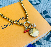 Load image into Gallery viewer, Repurposed Large Louis Vuitton Disc &amp; Cherry/Snowflake Charm Necklace