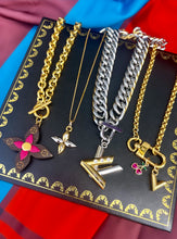 Load image into Gallery viewer, Repurposed Louis Vuitton Puffy V Logo Charm &amp; Heart Shaped Cerises KeyClap Necklace