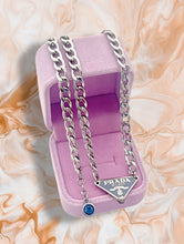 Load image into Gallery viewer, Repurposed Icy Blue &amp; Silver PRADA Tag Hardware Necklace