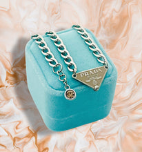 Load image into Gallery viewer, Repurposed Mocha Mousse &amp; Silver PRADA Tag Hardware Necklace