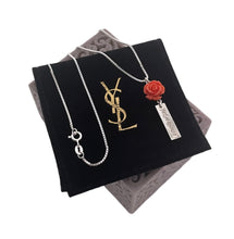 Load image into Gallery viewer, Repurposed Yves Saint Laurent Vertical Bar &amp; Vintage Rose Charm Necklace