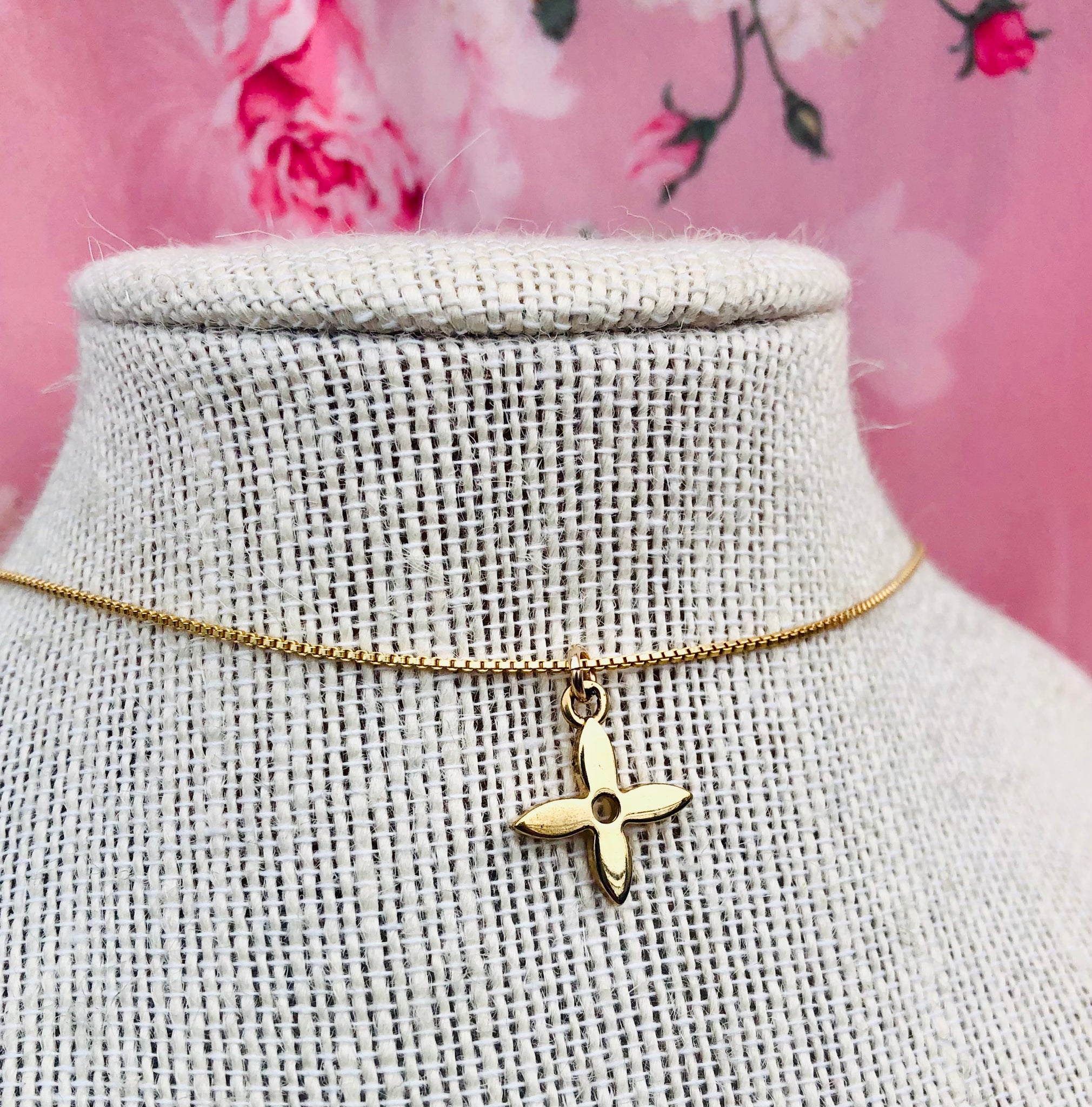 Authentic reworked Louis Vuitton small charm necklace.